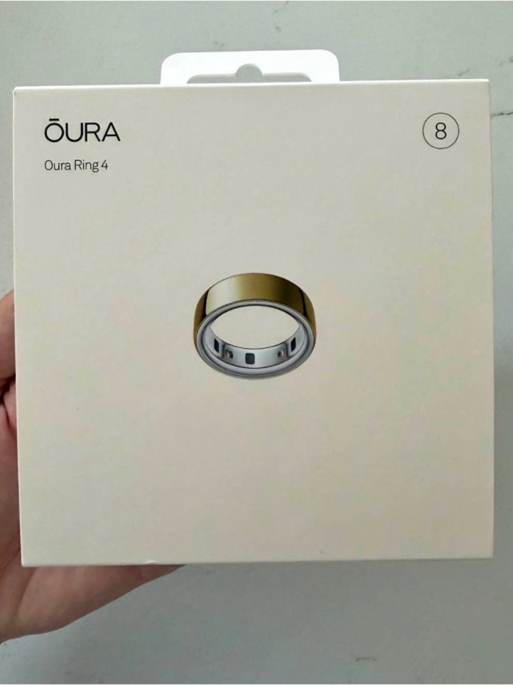Oura Ring 4 Gold Exterior with White Inner Band